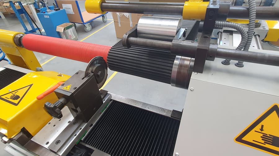 Production of a Timing Belt from a Sleeve on Our New Beyer Automatic Cutting Machine